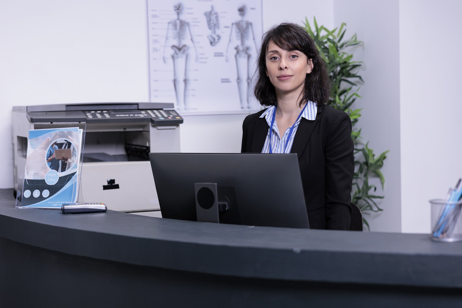 physical-therapy-receptionist-in-the-front-desk Physical therapy receptionist in the front desk