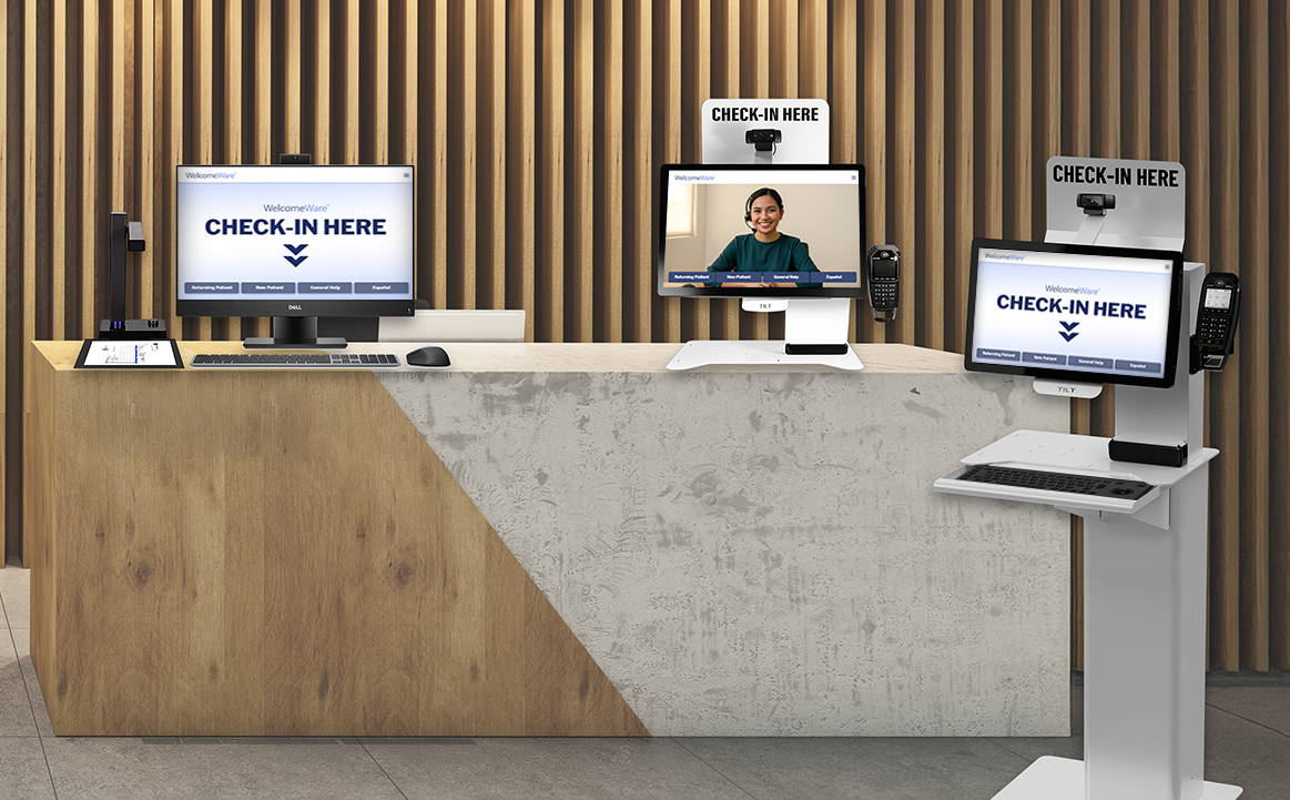 a clinic front desk showing the WelcomeWare kiosks